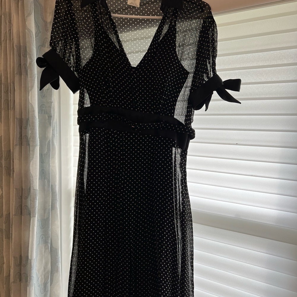 Classic, elegant black and white polka dot dress
